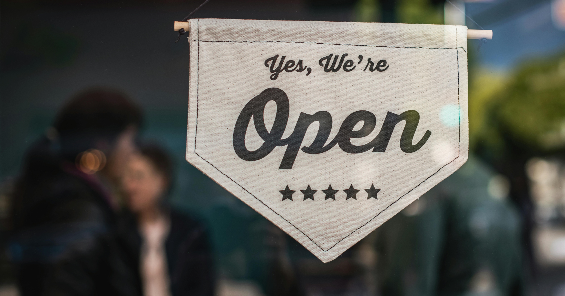 Small business with an open sign on the window