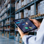 Worker Taking Inventory in a Warehouse